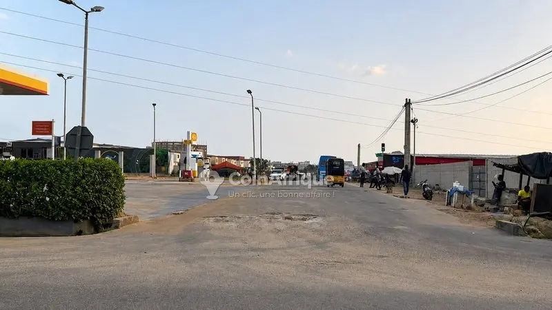 Terrain 1 500 m² potentiel commercial — Bingerville