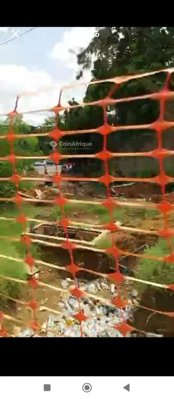 Terrain commercial 971 m² — Cocody Danga